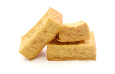 Tofu block and cut cubes, isolated on white background.