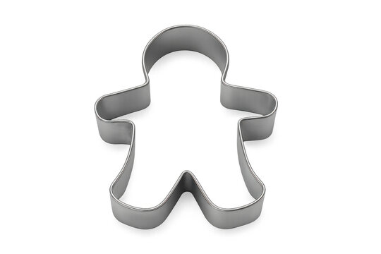 Metal gingerbread man cookie cutter gleaming against transparent backdrop, preparing festive holiday baking