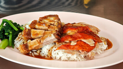 Crispy pork and red pork on rice