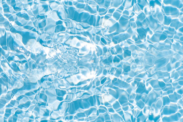 Blue water with ripples on the surface. Defocus blurred transparent blue colored clear calm water...