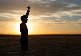 Fototapeta premium Silhouetted Man Celebrates Sunset in Open Field. Generative Ai