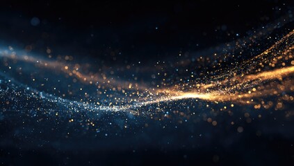 Abstract swirling particles of gold and blue in dark background
