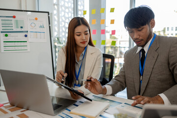 entrepreneurs discuss together to brainstorm and solve problems in various departments of the...