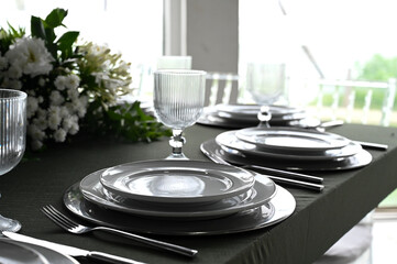 table set in ballroom, elegant wedding reception table with candlesticks, luxury dinner arrangement...