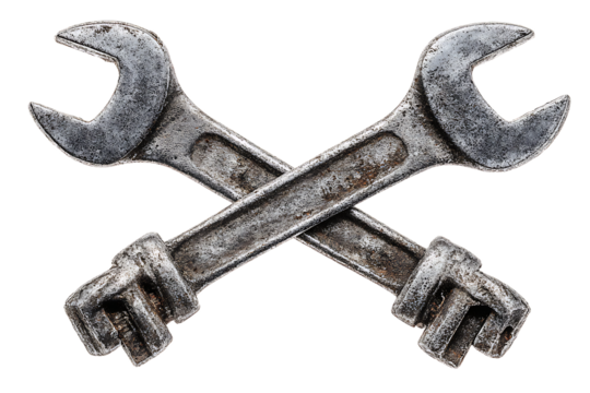 Two crossed wrenches, rusty and old.