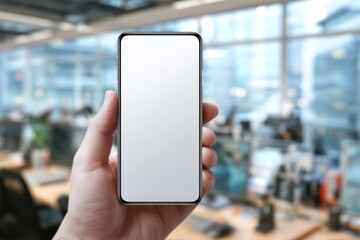 Hand Holding Smartphone with Blank Screen Mockup in the Office