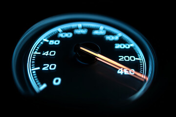 speedometer on black background