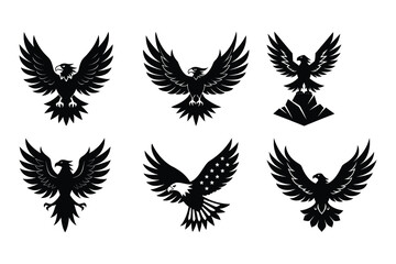 Obraz premium Black eagles spread wings silhouette