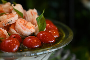 shrimp caprese, shrimp caprese salad with cherry tomatoes and mozzarella, gourmet seafood caprese served in glass bowl, elegant shrimp appetizer with basil

