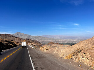 Pan American Highway going through Peruvian Andes. Desert and mountains view during traveling...