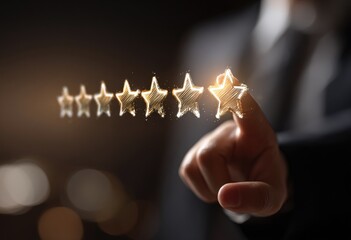 Hand points to glowing gold stars, signifying high rating