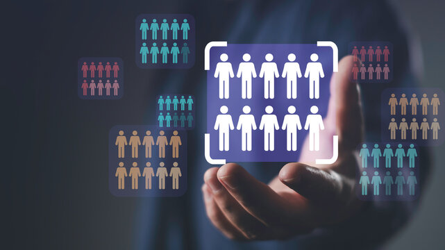 Target audience and market segmentation concept showing group of people icons selected through digital interface for marketing analysis and customer focus strategy.