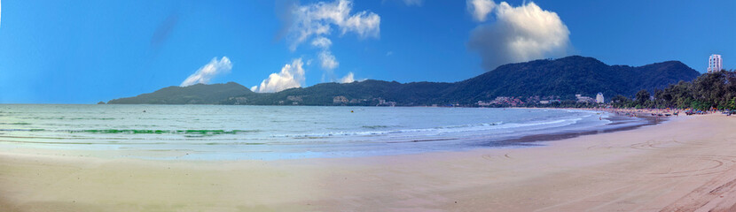 Beautiful and colourful Panorama of Patong Beach at Sunset on the romantic island of Phuket Thailand 