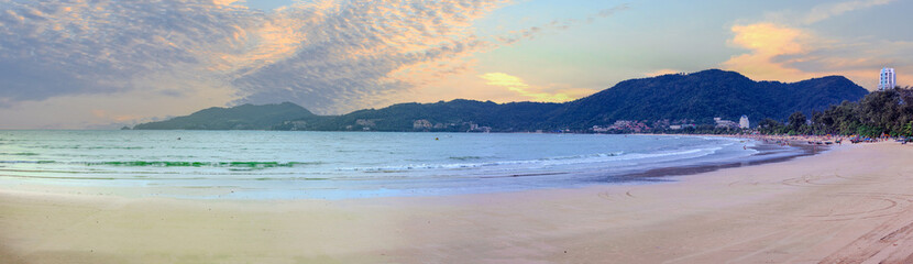 Beautiful and colourful Panorama of Patong Beach at Sunset on the romantic island of Phuket Thailand 