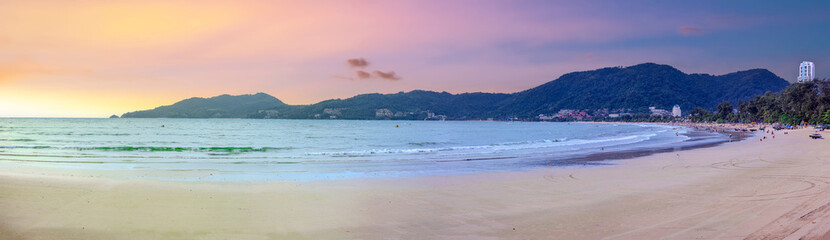 Beautiful and colourful Panorama of Patong Beach at Sunset on the romantic island of Phuket Thailand 