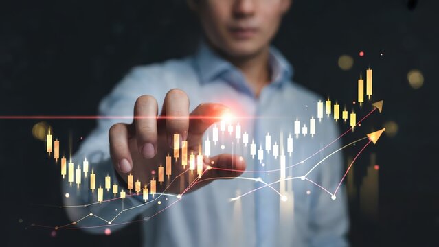 Businessman anticipates growth, touching a financial stock chart with hand
