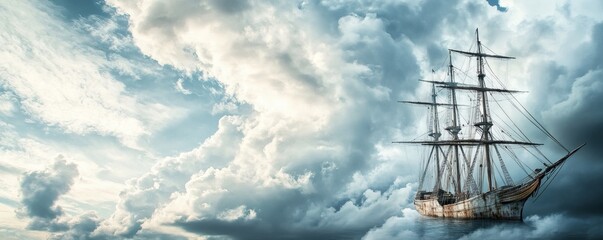 Majestic ship sailing through dramatic cloudscape.