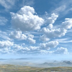 Vast, fluffy clouds over a hazy landscape