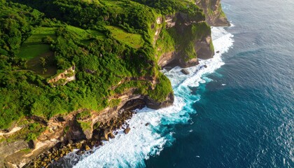 Lush cliffs meet crashing waves