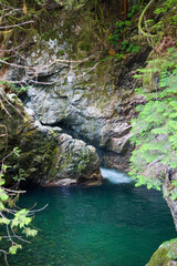 Cascade with Crystal Blue Water in National Park