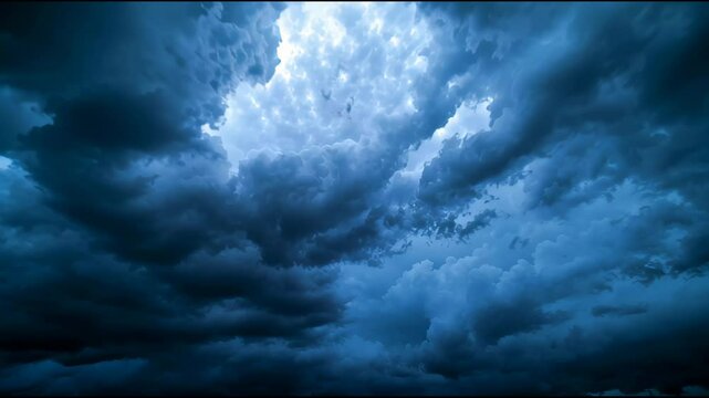 Dramatic Sky with Dark Swirling Storm Clouds Moody Blue and Gray Hues Evoke Intense Weather Change and Anticipation