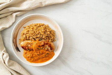 grilled chicken steak with red curry sauce and rice