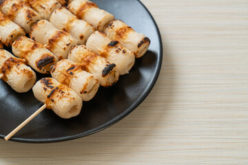 grilled tube shaped fish paste cake skewe or tube squid skewer