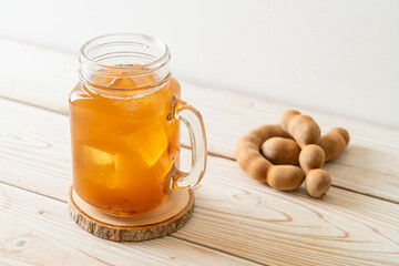 Delicious sweet drink tamarind juice and ice cube