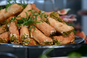 pistachio straws, pastry dough filled with pistachio cream, puff pastry	