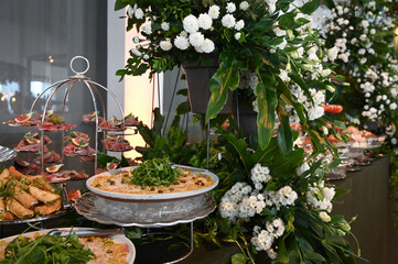 carpaccio , thin beef carpaccio with arugula and parmesan, gourmet meat appetizer with vinaigrette topping, elegant carpaccio platter served cold for events	