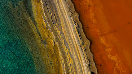 Red salt sea lake, at winter, village Alyki, Boeotia, Greece.