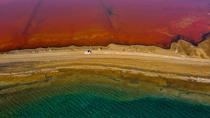 Red salt sea lake, at winter, village Alyki, Boeotia, Greece.