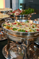 spaghetti, spaghetti with cheese and cherry tomatoes, tagliatelle, delicious pasta dishes, buffet display, gourmet buffet, pasta, hot dishes, elegant buffet trays, haute cuisine, buffet for events


