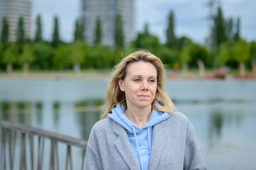 City Lake Woman Looking Thoughtful