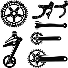 Collection of black and white bicycle drivetrain components and handlebars