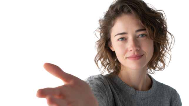 Friendly young woman smiling and reaching out her hand in an inviting gesture, white isolate background.