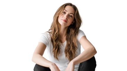 Young woman sitting casually with a relaxed expression, isolated on white background.