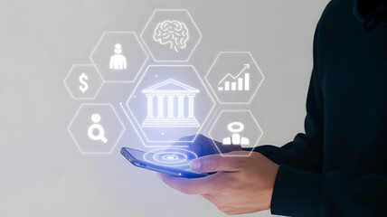 Person holding smartphone with financial and business icons