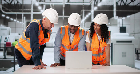 Inspecting Automated Manufacturing Process In Factory. Diverse Team