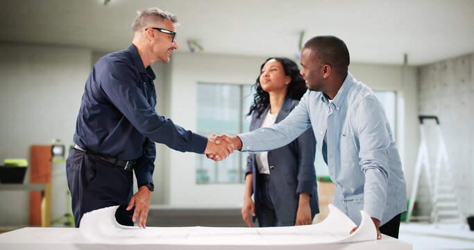 Young Couple Collaborating With Trusted House Designer