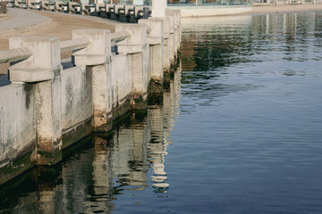 promenade and old pier on the sea