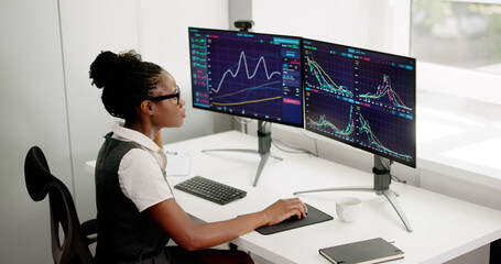 African Woman Broker Monitoring Trading Market