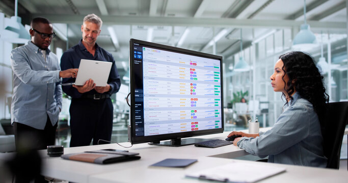 Diverse Team Of Accountants Analyzing Data - Powered by Adobe