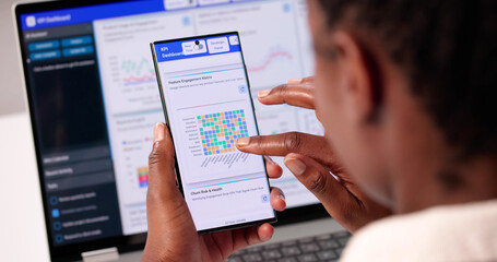 Smart African Woman Analyzes Market Trends