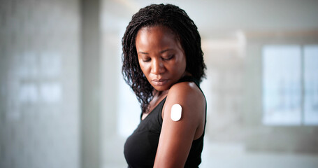 Caring For Her Health: A Young Diabetic Patient Monitors Glucose Levels