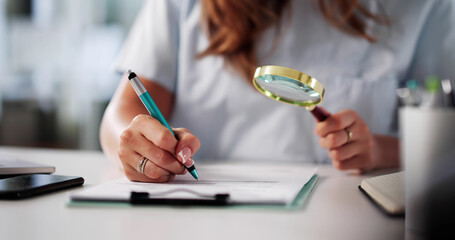 Female Auditor Examines Fraudulent Medical Billing