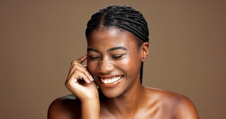 Laughing, happy or black woman in studio with beauty, satisfaction or healthy glow. Humor, smile or...