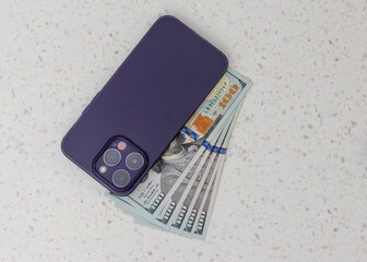 Modern Smartphone with Hundred Dollar Bills