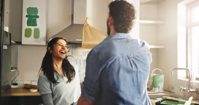 DIY, laughing and renovation with couple in kitchen of apartment together for remodeling project. Funny, maintenance and painting with happy people in new home for improvement or property investment - Powered by Adobe