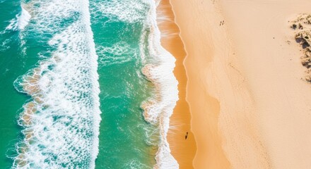 Aerial View of Turquoise Ocean Waves Meeting Sandy Beach